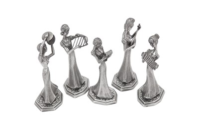Lot 355 - Five late 20th century sterling silver musical figures, import marks for London 1973 by Mappin and Webb