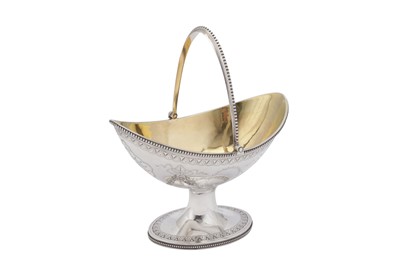 Lot 427 - A Victorian sterling silver sugar basket, London 1871 by Henry Holland