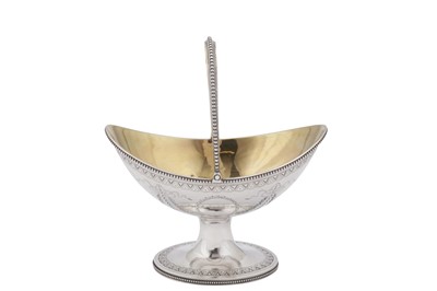 Lot 427 - A Victorian sterling silver sugar basket, London 1871 by Henry Holland