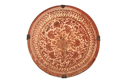 Lot 350 - AN HISPANO-MORESQUE COPPER LUSTRE-PAINTED POTTERY CHARGER