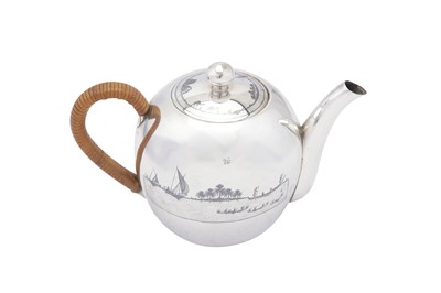 Lot 185 - An early 20th century Iraqi silver and niello teapot, circa 1927-29 signed Omara Shoodod