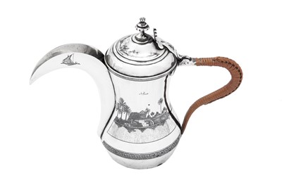 Lot 186 - An early 20th century Iraqi silver and niello Dallah coffee pot, Omara circa 1927-29, signed Abdul Jabbar