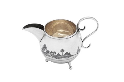 Lot 184 - An early 20th century Iraqi silver and niello milk jug, Omara circa 1927-29, signed Shoodod