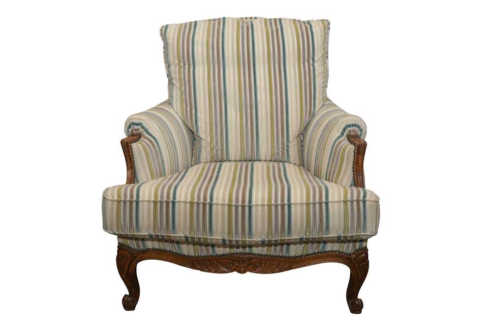 Lot 582 - A FRENCH LOUIS XV STYLE CARVED BEECH BERGERE ARMCHAIR, 20TH CENTURY