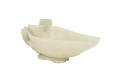 Lot 21 - A CHINESE PALE CELADON JADE 'LOTUS LEAF' POURING VESSEL.