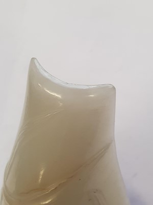 Lot 21 - A CHINESE PALE CELADON JADE 'LOTUS LEAF' POURING VESSEL.