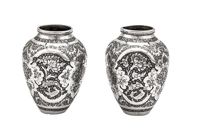 Lot 219 - A pair of mid-20th century Iranian (Persian) silver vases, Isfahan circa 1940 mark of Mehr Afshan