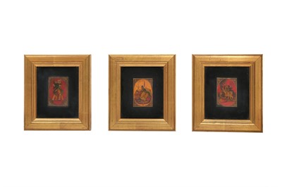 Lot 404 - THREE QAJAR LACQUERED GAMING CARDS WITH EROTIC SUBJECTS