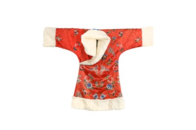 Lot 382 - A CHINESE FUR-LINED RED-GROUND EMBROIDERED SILK LADY'S ROBE.