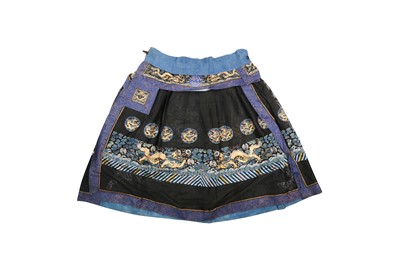 Lot 381 - A CHINESE BLACK GROUND SILK GAUZE 'DRAGON' CHAOFU SKIRT.