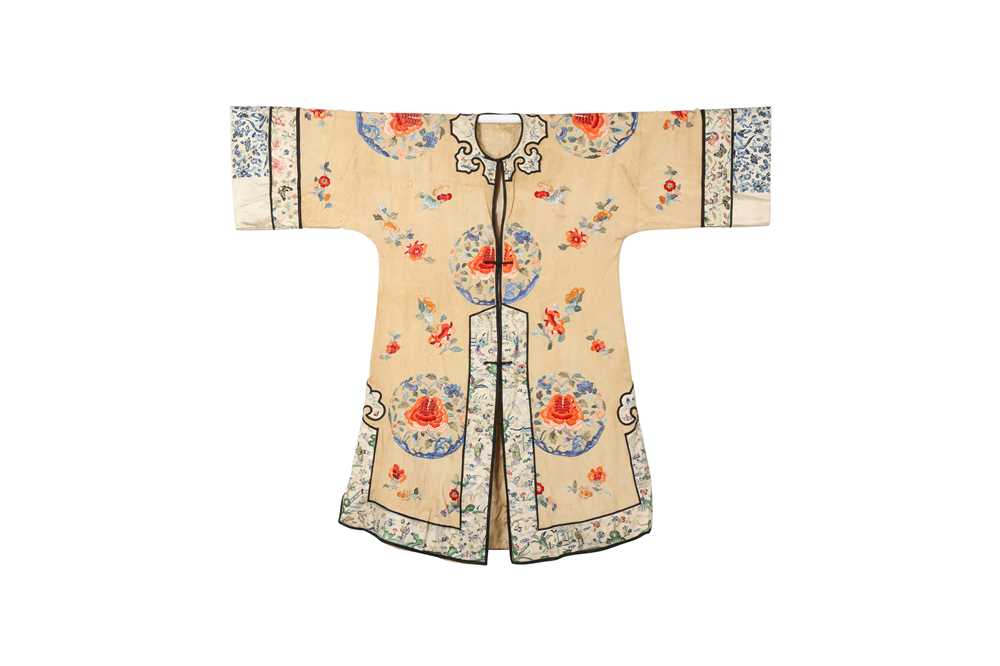 Lot 383 - A CHINESE APRICOT-GROUND EMBROIDERED SILK LADY'S ROBE.