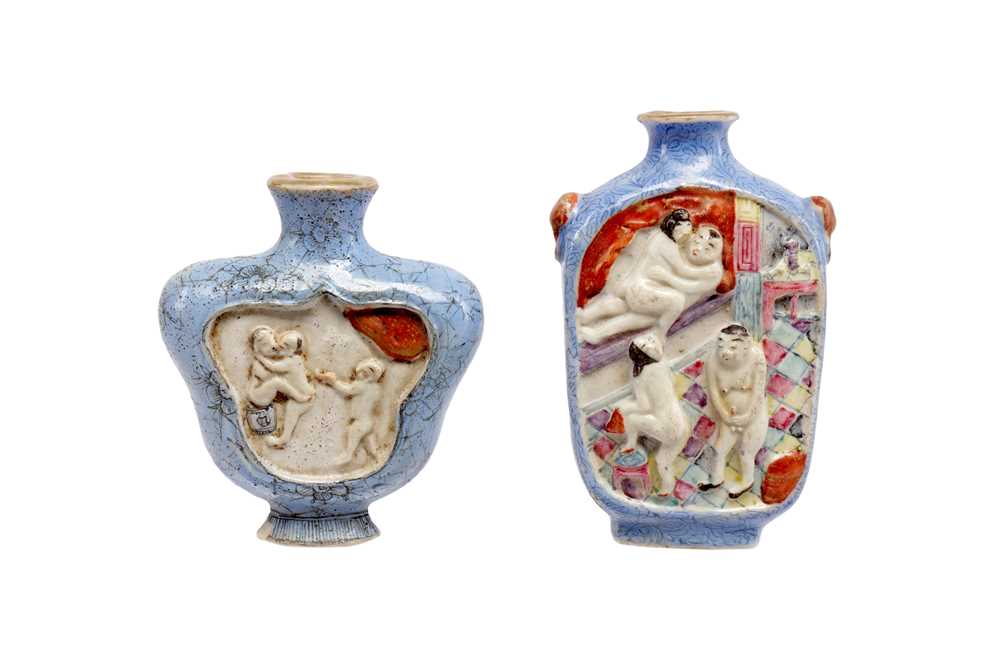 Lot 1035 - TWO CHINESE MOULDED FAMILLE ROSE SNUFF BOTTLES