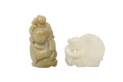Lot 243 - TWO CHINESE PALE CELADON JADE 'BOYS' CARVINGS.