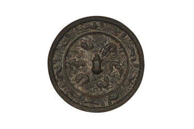 Lot 521 - A CHINESE BRONZE MIRROR.