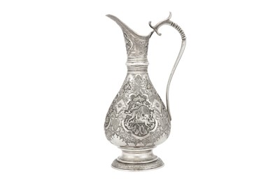 Lot 381 - A LARGE REPOUSSÉ SILVER JUG WITH ANIMALS AND FLORAL DECORATION