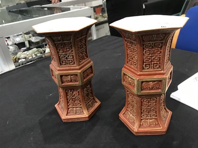 Lot 105 - A PAIR OF CHINESE GILT-DECORATED CORAL-RED HEXAGONAL-SECTION VASES, GU.