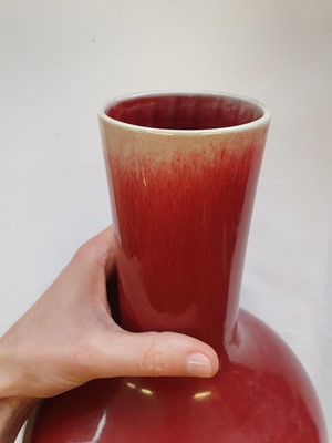 Lot 33 - TWO CHINESE COPPER RED-GLAZED VASES.