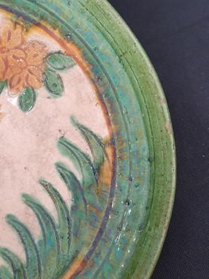 Lot 145 - A CHINESE SANCAI-GLAZED 'DEER' DISH AND A GREEN-GLAZED BOWL.