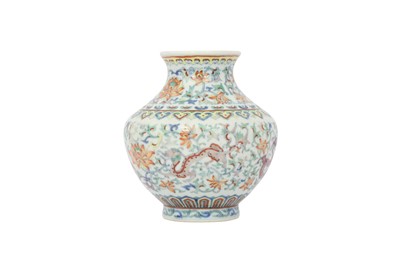Lot 641 - A CHINESE DOUCAI 'DRAGON AND LOTUS' VASE.