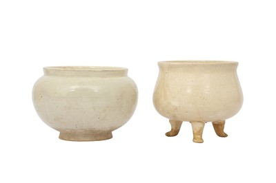 Lot 497 - TWO CHINESE CREAM-GLAZED POTTERY PIECES.