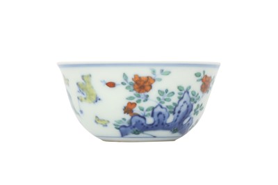 Lot 615 - A CHINESE DOUCAI 'CHICKEN' CUP.