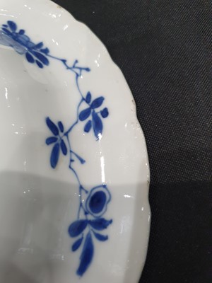 Lot 136 - A CHINESE BLUE AND WHITE DISH AND AN IRON-RED DISH.