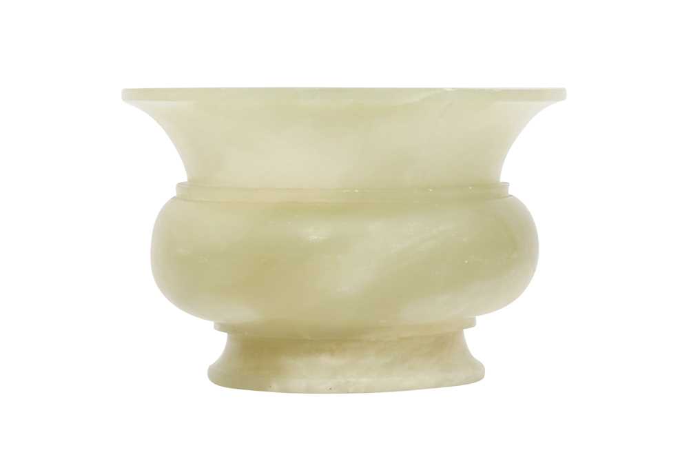 Lot 782 - A CHINESE PALE CELADON JADE SPITTOON, ZHADOU.
