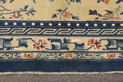 Lot 17 - A CHINESE CARPET