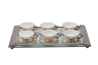 Lot 106 - A mid-20th century Vietnamese silver mounted glass tea tray with cups and saucers, circa 1960