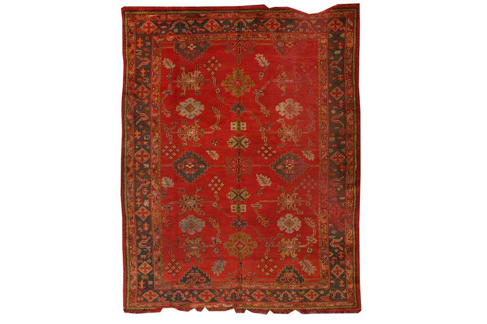 Lot 101 - AN ANTIQUE USHAK CARPET, TURKEY