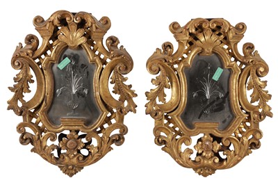 Lot 299 - A PAIR OF CONTINENTAL GILTWOOD BAROQUE TASTE HINGED PIER MIRRORS, 19TH CENTURY