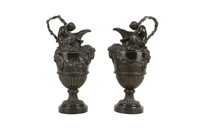 Lot 374 - A PAIR OF PATINATED BRONZE EWERS, 19TH CENTURY