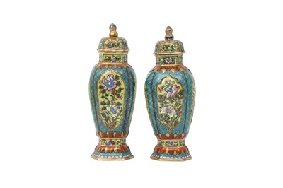 Lot 109 - A PAIR OF CHINESE BLUE AND WHITE CLOBBERED VASES AND COVERS.