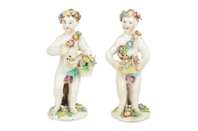 Lot 64 - A PAIR OF BOW PORCELAIN PUTTI, 18TH CENTURY