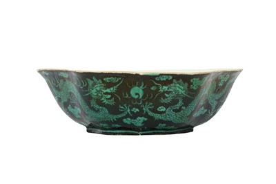 Lot 611 - A CHINESE GREEN AND BLACK ENAMELLED 'DRAGON' BOWL.