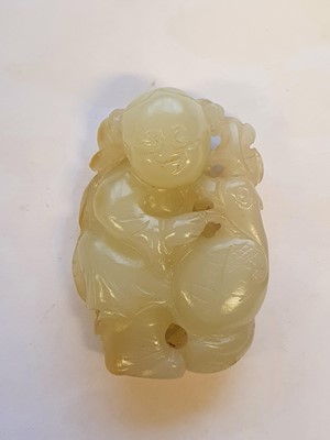 Lot 441 - A CHINESE WHITE JADE 'BOY AND GOOSE' CARVING.