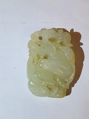 Lot 441 - A CHINESE WHITE JADE 'BOY AND GOOSE' CARVING.