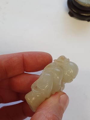 Lot 441 - A CHINESE WHITE JADE 'BOY AND GOOSE' CARVING.