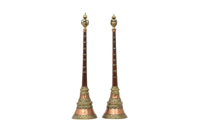 Lot 287 - A PAIR OF TIBETAN CEREMONIAL BRASS-DECORATED COPPER RADONG TRUMPETS.