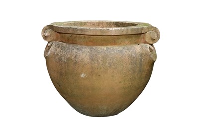 Lot 48 - A RECONSTITUTED STONE GARDEN PLANTER OF TERRACOTTA HUE