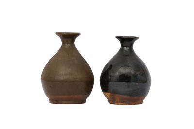 Lot 496 - TWO CHINESE POTTERY BOTTLE VASES.