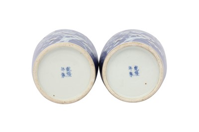 Lot 277 - A PAIR OF BLUE AND WHITE AND UNDERGLAZE RED 'PRUNUS' VASES.