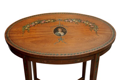 Lot 271 - An Edwardian satinwood oval table