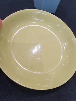 Lot 121 - A CHINESE YELLOW-GLAZED DISH AND A PALE BLUE VASE.