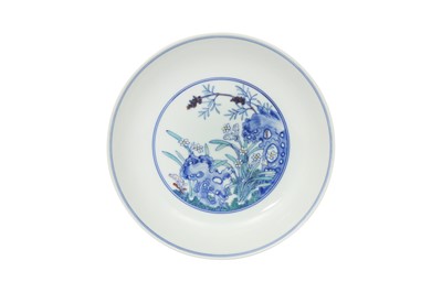 Lot 555 - A CHINESE DOUCAI 'WILDFLOWERS' DISH.