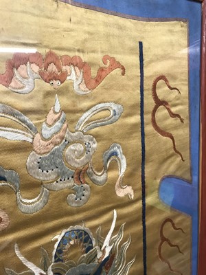 Lot 378 - A CHINESE EMBROIDERED YELLOW-GROUND 'DRAGON' SILK FLAG.