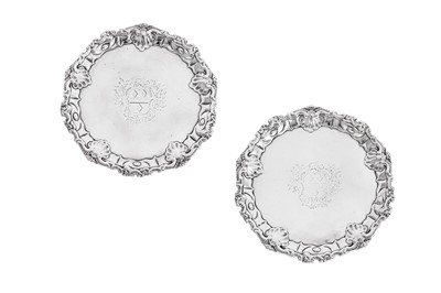 Lot 483 - A pair of early George III sterling silver waiters, London 1764 by Thomas Hannam and Richard Mills