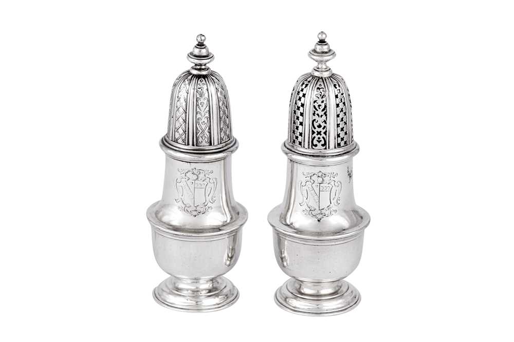 Lot 445 - A pair of George II sterling silver casters, London 1735 by Charles Hatfield