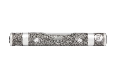 Lot 98 - A large early 20th century Ceylonese (Sri Lankan) unmarked silver scroll holder, probably Kandy circa 1920