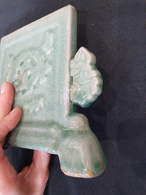 Lot 77 - A CHINESE LONGQUAN CELADON MINIATURE TABLE SCREEN AND A JUG.